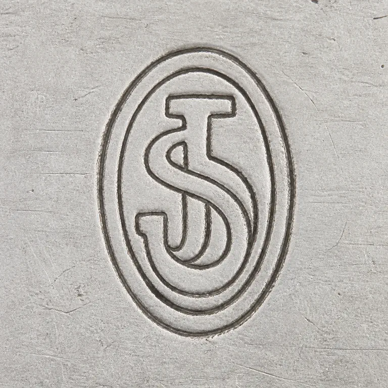 Johannes Siggaard: One vertical oval joined JS-like monogram; oxidized reconstruction.