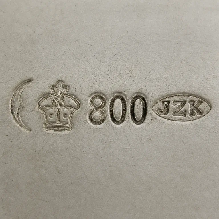 Richard Köberlin: Crescent, crown, 800, and JZK oval; oxidized reconstruction.