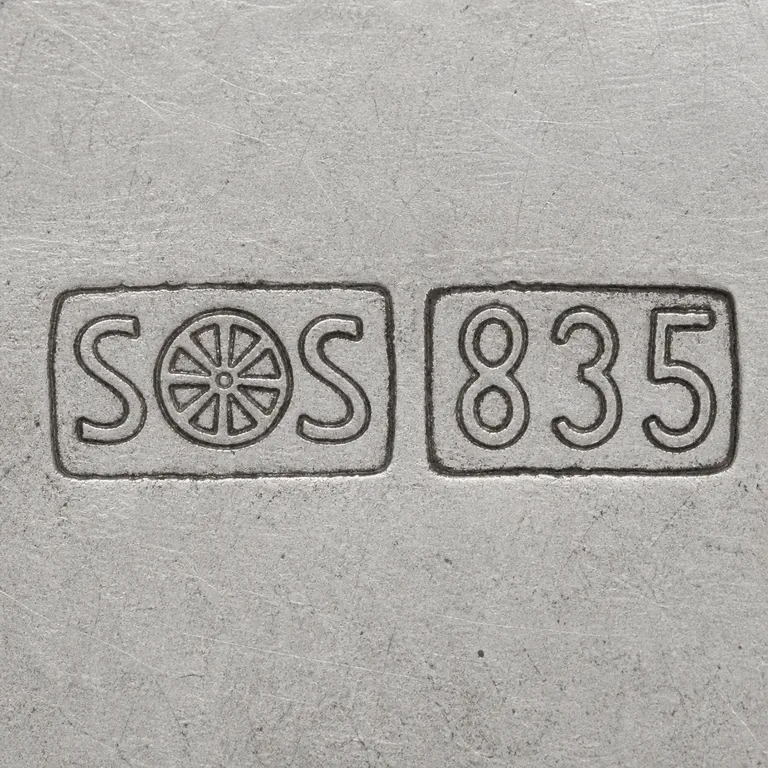 looking for info: Visible text, numerals, symbol order, and source-bounded device geometry; oxidized reconstruction.